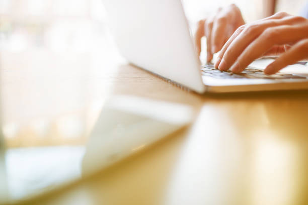 istock Girl in cafe with laptop 1151410366