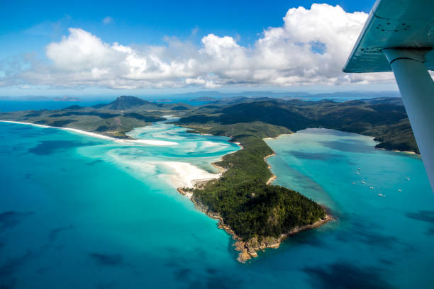 Flying over the Whitsunday Islands stock photo