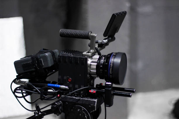 istock Professional cinema digital video camera on a tripod. 1151423800