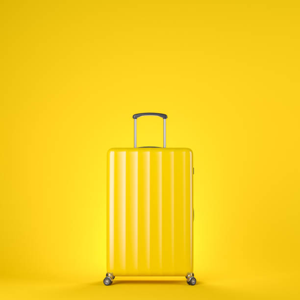 istock Yellow suitcase over yellow 1151423968