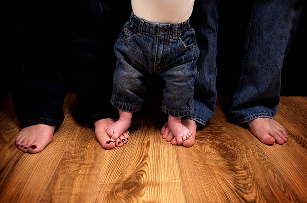 istock baby boy feet portraits 115142488