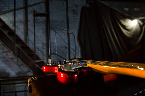 istock Red bass guitar close-up. Music instruments. Macro. 1151425022