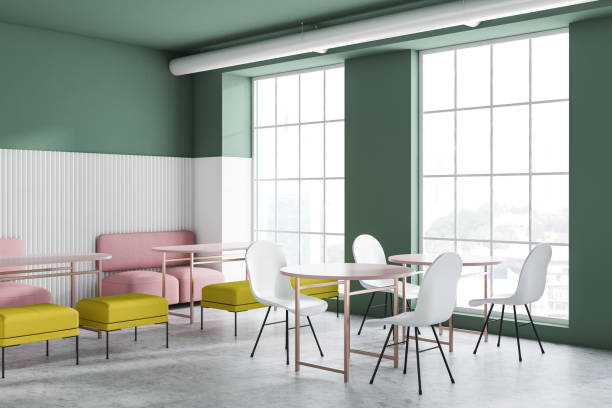 istock Bright green and white cafe interior 1151426800