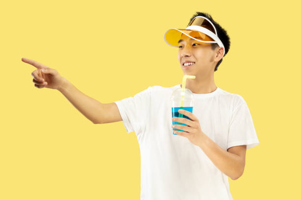 istock Korean young man's half-length portrait on yellow background 1151427062