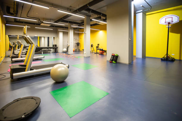 istock Gym with basketball hoop 1151429584