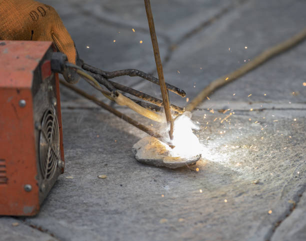 istock worker welder weld metal wire 1151430623