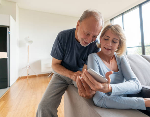 istock Senior couple social networking at home on a tablet computer 1151432648