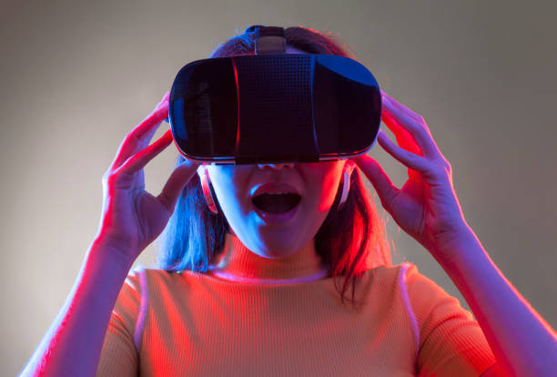 istock Young girl with VR goggles on head 1151432914