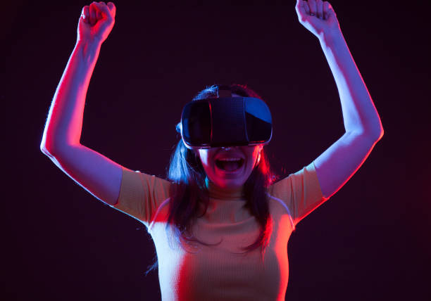 istock Young girl with VR goggles on head 1151433718