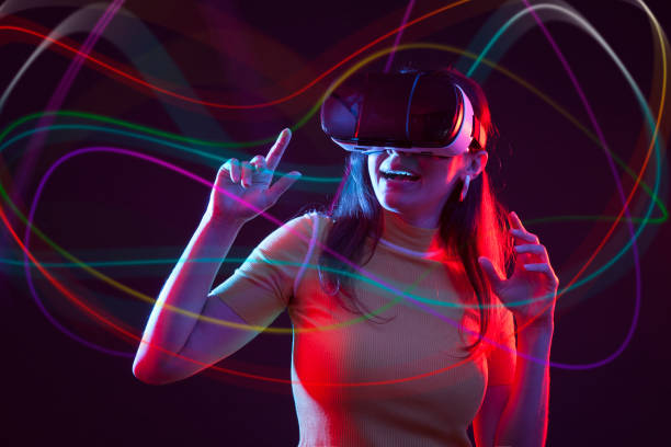 istock Young girl with VR goggles on head 1151433732