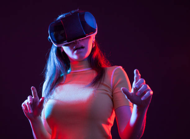 istock Young girl with VR goggles on head 1151433905