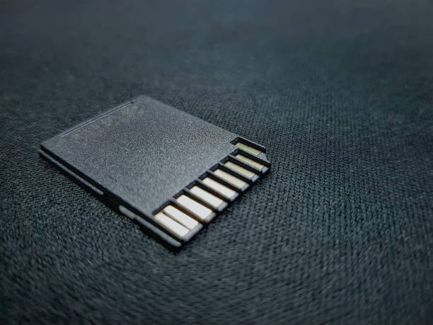 istock Close-up Black SD Card for Storing Media Files with Selective Focus 1151435290