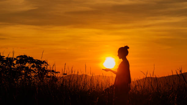 istock silhouette people and view of mountains 1151436170