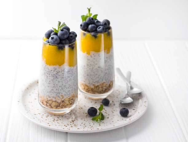 istock Healthy vanilla chia pudding in a glass with fresh blueberries and mint. 1151439372
