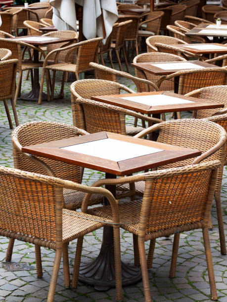 istock Tables and chairs of bistro 1151441859