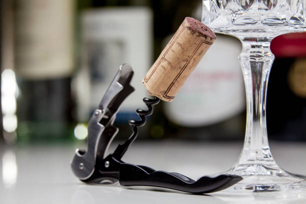 istock Modern metal corkscrew against the background of wine 1151442801