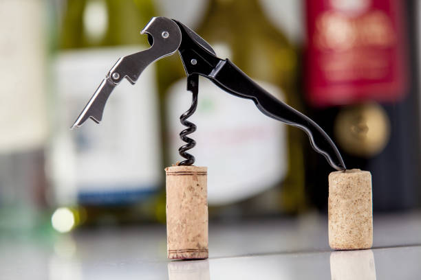 istock Modern metal corkscrew against the background of wine 1151442846