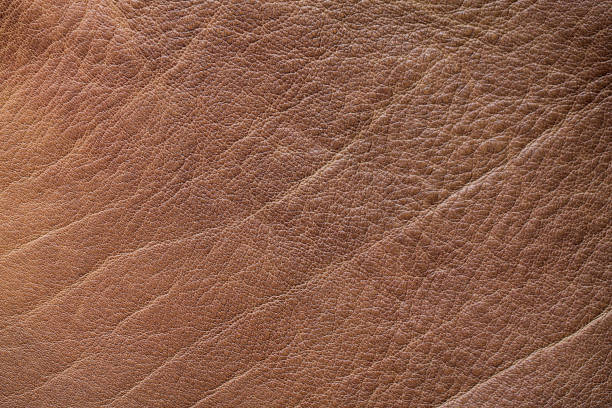 istock Natural background with brown leather of a rough texture. 1151446946