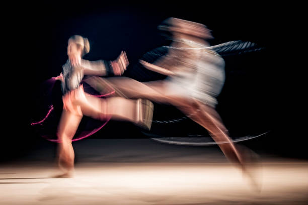 istock Two female dancers in blurred motion 1151449468