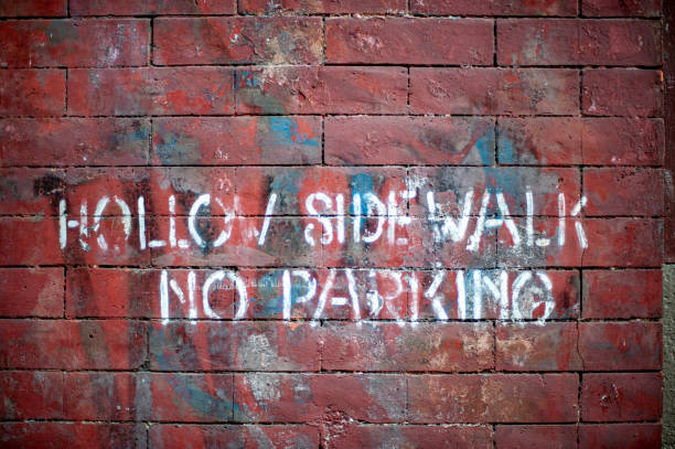 istock Hollow sidewalk no parking 1151449605