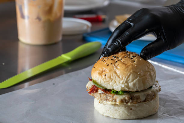 istock Chef finishing the vegetarian burger 1151449824