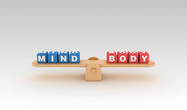 istock Seesaw with MIND BODY Buzzword Cubes - 3D Rendering 1151449958