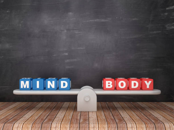 Seesaw Scale with MIND BODY Cubes on Chalkboard Background - 3D Rendering
