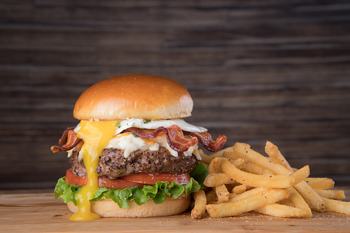Fresh bacon egg burger with french fries