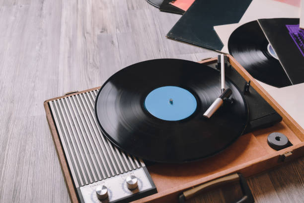 istock Older gramophone on gray wooden 1151450753