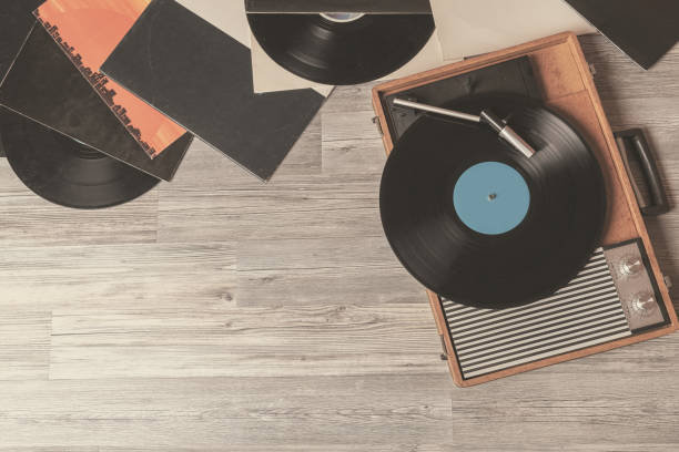 istock Vintage gramophone on gray wooden 1151450758