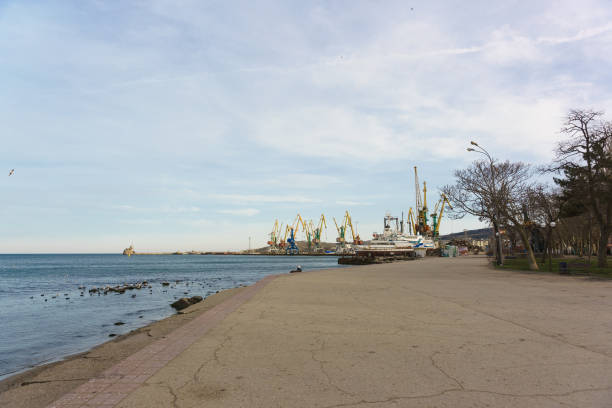 Cargo seaport in the resort town of Feodosia in Crimea Cargo seaport in the resort town of Feodosia in the Crimea. Off-season feodosiya stock pictures, royalty-free photos & images