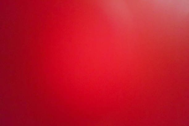 istock background of red leather shoot blurry and grainy by mobile camera. 1151461938