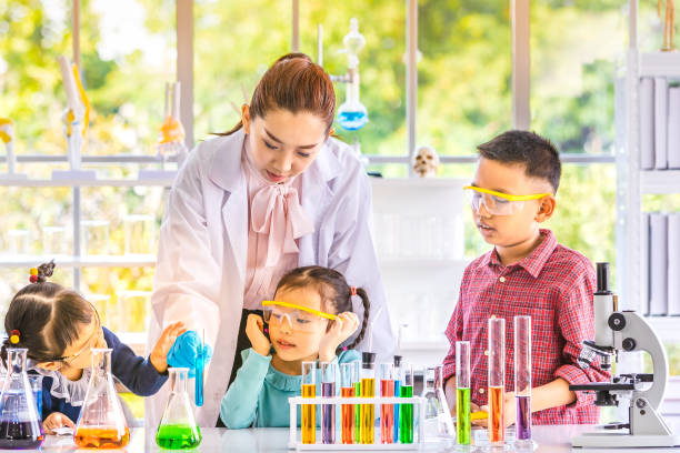 istock Teacher and students, smoke float out from blow. 1151463664