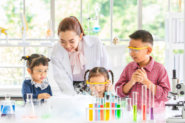 istock Teacher and students, smoke float out from blow. 1151466704