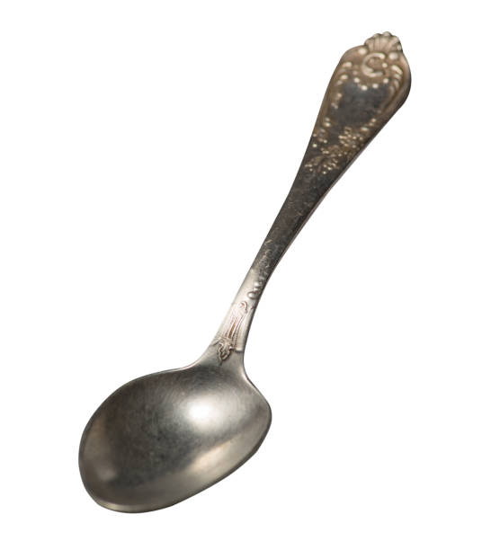 istock spoon isolated on white background. metal spoon. vintage spoon. 1151467997
