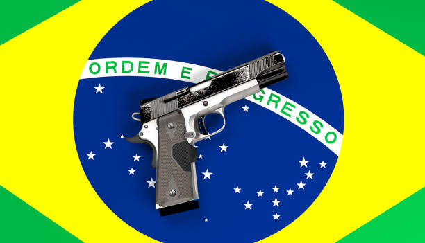 istock Handgun on Brazilian flag 1151470504