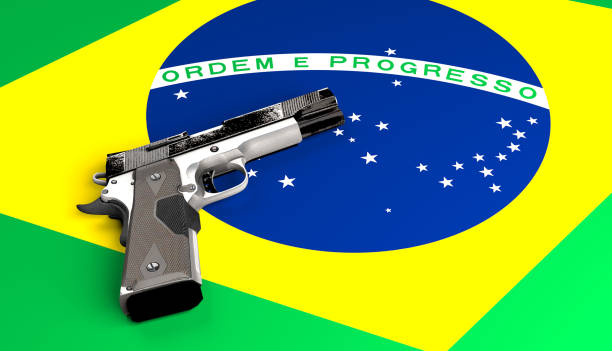 Handgun on Brazilian flag Handgun on Brazilian flag gun laws stock pictures, royalty-free photos & images