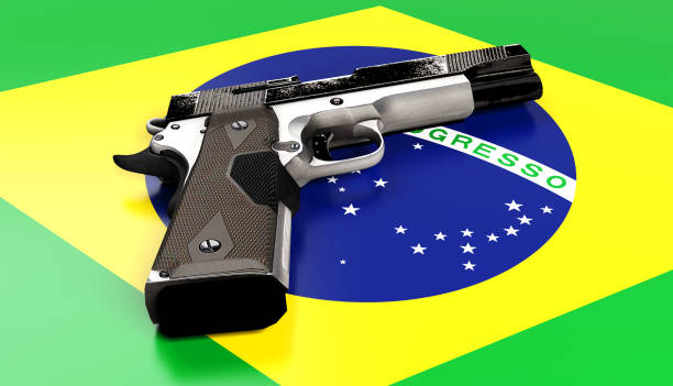 istock Handgun on Brazilian flag 1151470580