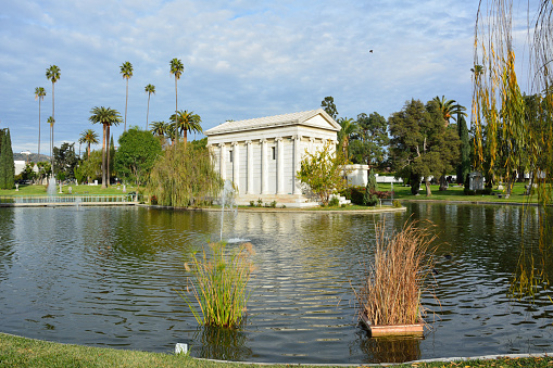 Los Angeles, California, United States of America - January 7, 2017. Tomb of philanthropist William A. Clark Jr., across Sylvan Lake at Hollywood Forever Cemetery in Los Angeles, CA.