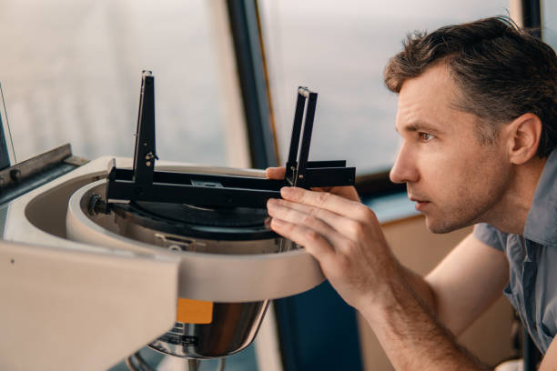 istock deck officer taking magnetic compass error onboard of vessel 1151474855
