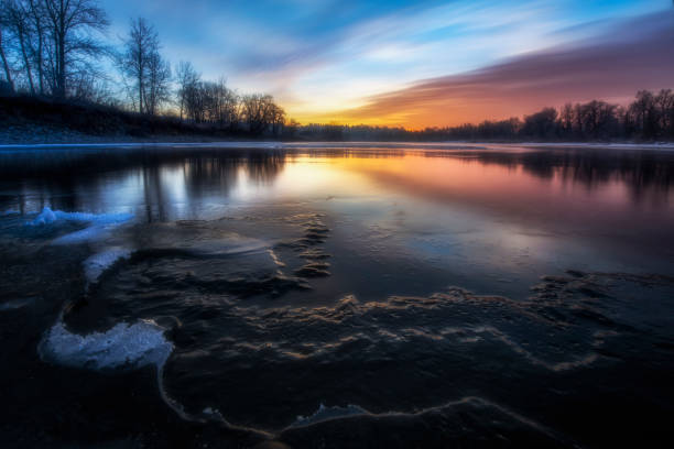 istock Sunrise over the water 1151475520