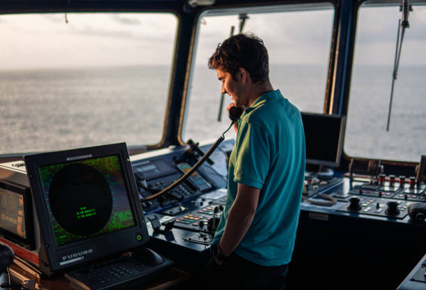 istock Marine navigational officer is reporting by VHF radio 1151475593