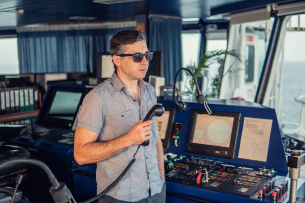 istock Marine navigational officer is reporting by VHF radio 1151475821