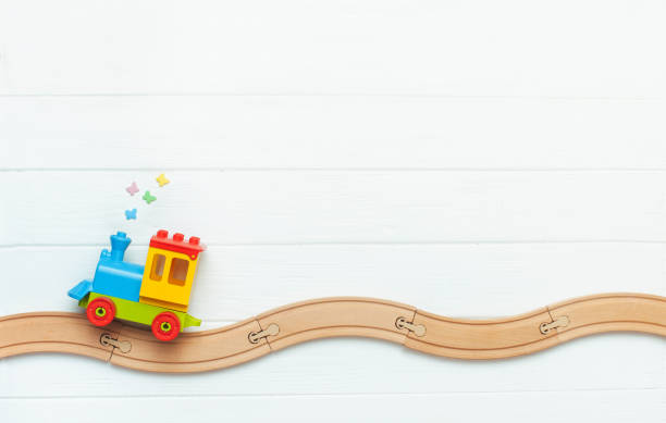 istock Kids train on toy wooden railway on white background 1151483727