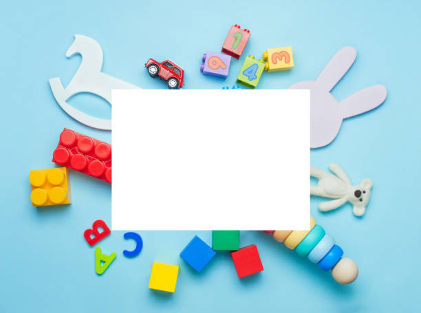 istock Kids toys on blue background with rectangle blank space 1151483744