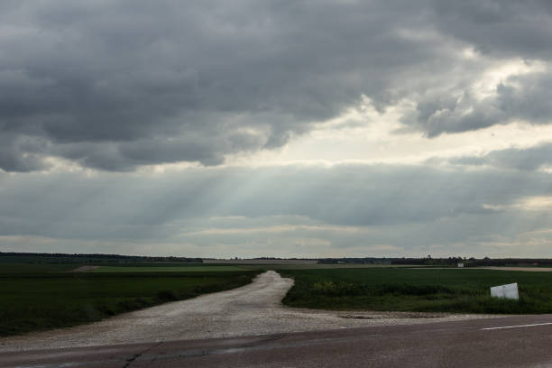 istock Country road at sunset 1151486669