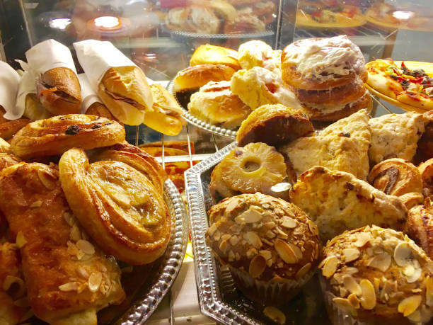 istock Modern bakery with different kind of breads biscuits and buns 1151487230