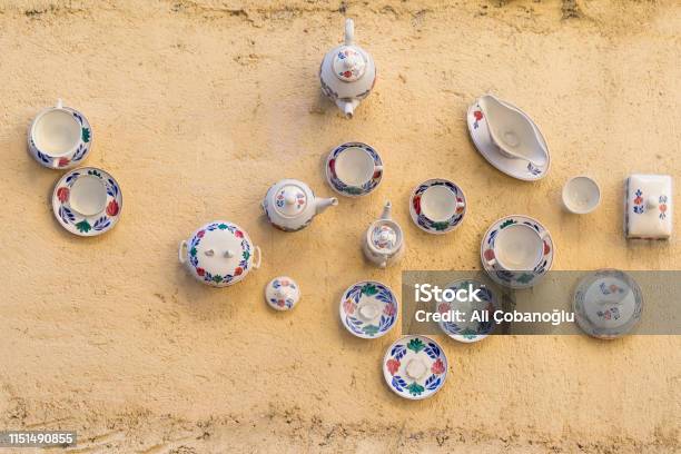 Antique Porcelain Teapots Glued To The Wall Stock Photo - Download Image Now - Antique, Breakfast, Coffee - Drink