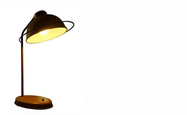 istock Yellow desk lamp isolated on white background. 1151497232
