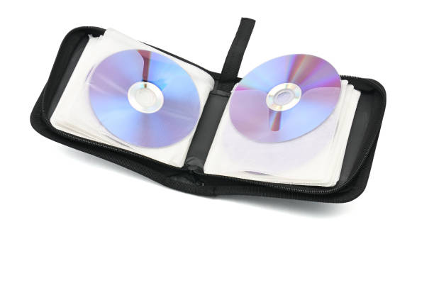 корпус для компакт-дисков и dvd-дисков на изолированном белом фоне - cd dvd disk lock стоковые фото и изображения